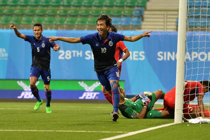 Cambodia's Keo Sokpheng celebrating after scoring his side's second goal against the Philippines, at Jalan Besar Stadium on Wednesday, June 3, 2015. -- PHOTO: THE NEW PAPER