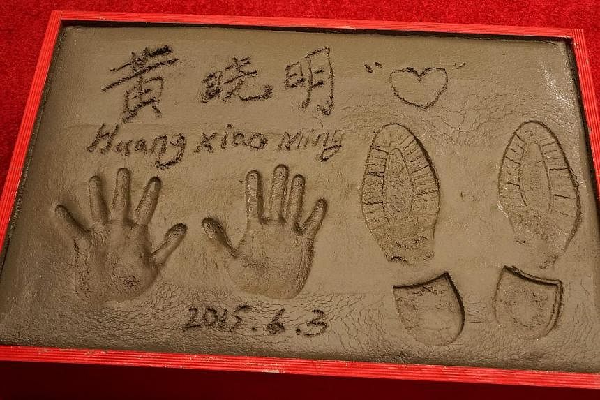 Chinese actor Huang Xiaoming's prints at the TCL Chinese Theatre in Hollywood, California, on June 3, 2015.-- PHOTO: EPA