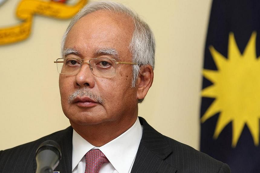 Prime Minister Datuk Seri Najib Razak is set to answer questions at an open townhall dialogue at the Putra World Trade Centre on Friday. -- PHOTO:&nbsp;BLOOMBERG