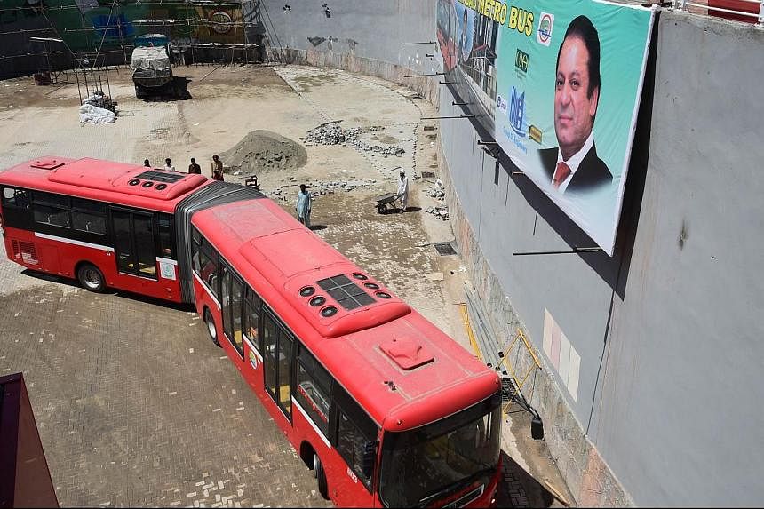 Pakistani Prime Minister Nawaz Sharif is due to open Islamabad's new half-billion dollar metrobus system on Thursday, which the government hopes will revolutionise transport in the capital but which has been criticised by some as extravagant. -- PHOT