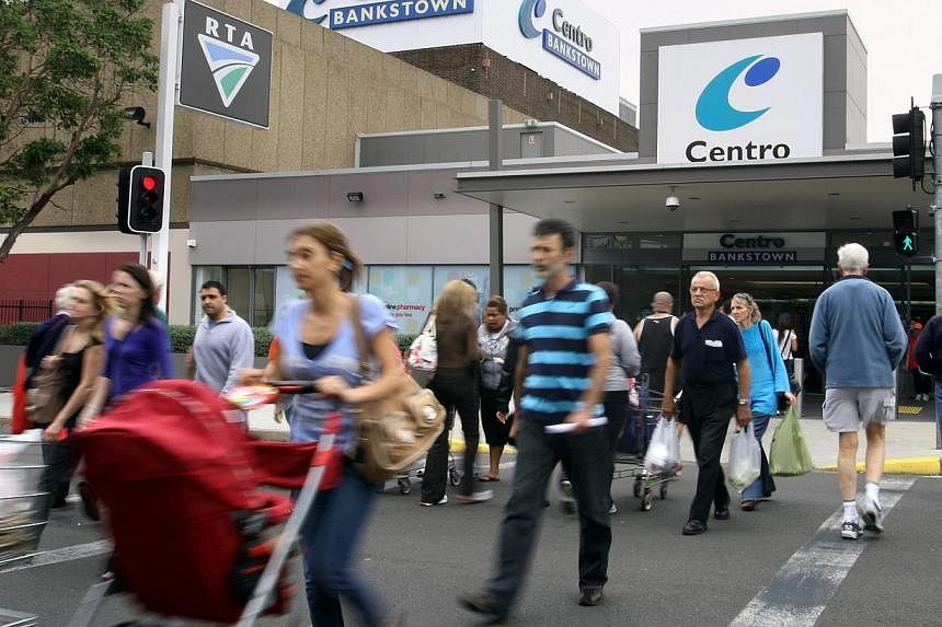 Shoppers outside a Sydney shopping centre in 2011. Australian retail sales went flat in April in a blow to hopes for a sustained pick up in consumer demand while the country's trade deficit blew out to a record as exports sagged, a double whammy that