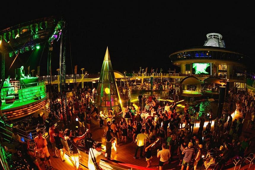 Partygoers having a wild time at the It's The Ship event (above) in November last year. The Costa Victoria cruise liner (below), which will be holding Shipsomnia.