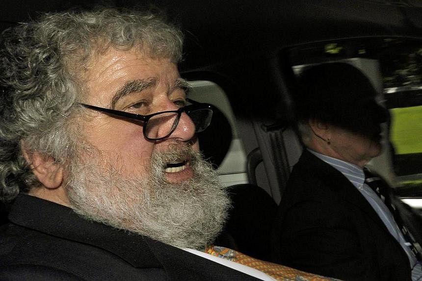 Fifa official Chuck Blazer leaving the Fifa headquarters in Zurich, Switzerland, after an ethics hearing over alleged corruption during the campaign for the Fifa presidency on May 29, 2011. -- PHOTO: EPA