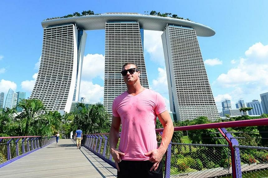 WWE Superstar Dolph Ziggler stands majestic in front of the iconic Marina Bay Sands on May 29, 2015. -- PHOTO: WWE