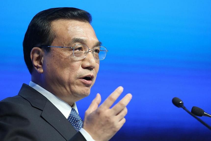 Chinese premier Li Keqiang said the government would promote domestic listings of start-up firms with "special ownership structure", part of China's efforts to encourage innovation and boost funding for productive sectors of the economy. -- PHOTO: BL