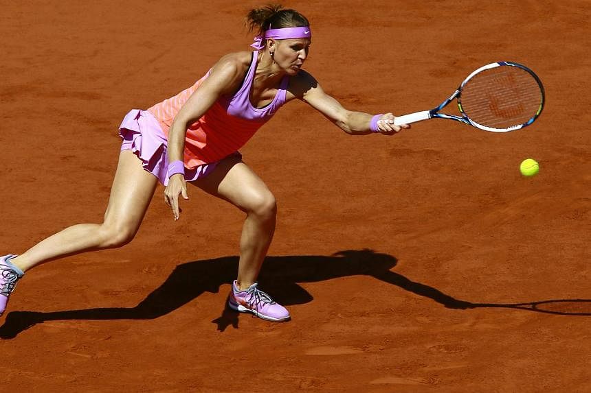 Lucie Safarova in action against Ana Ivanovic during the semi-final match at Roland Garros in Paris on June 4, 2015. -- PHOTO: EPA