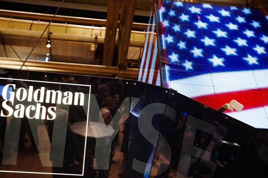 Goldman Sachs is in talks to pay US$2 billion to US$3 billion to settle a probe into its sales of mortgage bonds leading up to the financial crisis, according to a person with direct knowledge of the situation. -- PHOTO: REUTERS&nbsp;