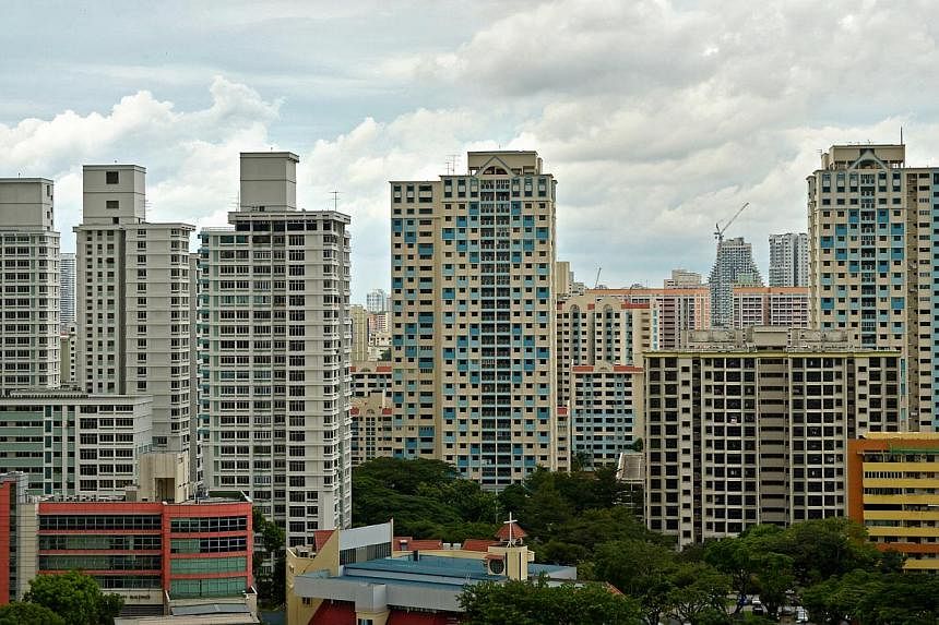 SRX Property data showed that resale prices were unchanged last month compared with April, when prices rose 0.2 per cent over March. -- PHOTO: ST FILE