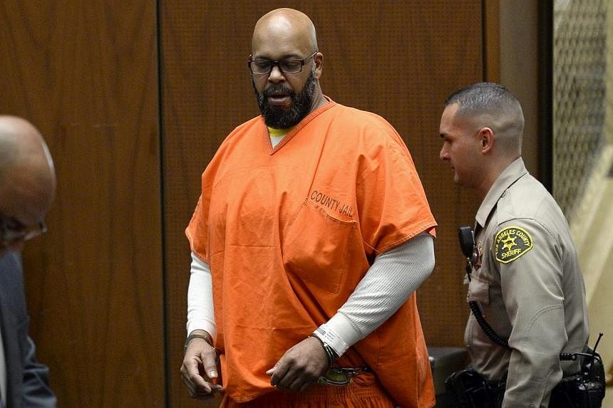 Suge Knight appearing in court for a arraignment hearing in his murder trial in Los Angeles, California, on April 30, 2015. The family of a man allegedly killed by Knight has filed a wrongful death lawsuit against the ex rap mogul as well as Dr Dre, 