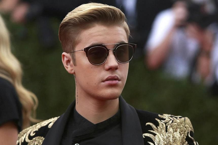 Justin Bieber at the Metropolitan Museum of Art Costume Institute Gala 2015. Bieber has pleaded guilty to assault and careless driving charges in connection with a collision near his Ontario hometown, Canadian media reported on Thursday. -- PHOTO: RE