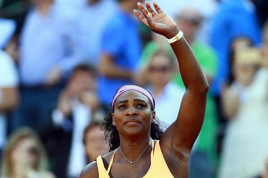 Serena Williams after her win against Timea Bacsinszky in their semi-final match at the French Open tennis tournament at Roland Garros in Paris on June 4, 2015. -- PHOTO: EPA&nbsp;