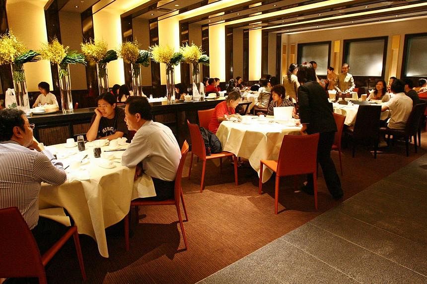 The interior of Imperial Treasure Super Peking Duck at Paragon. Navis Capital Partners will pay $60 million to $80 million for a majority stake in Imperial Treasure Restaurant Group. -- PHOTO: ST FILE