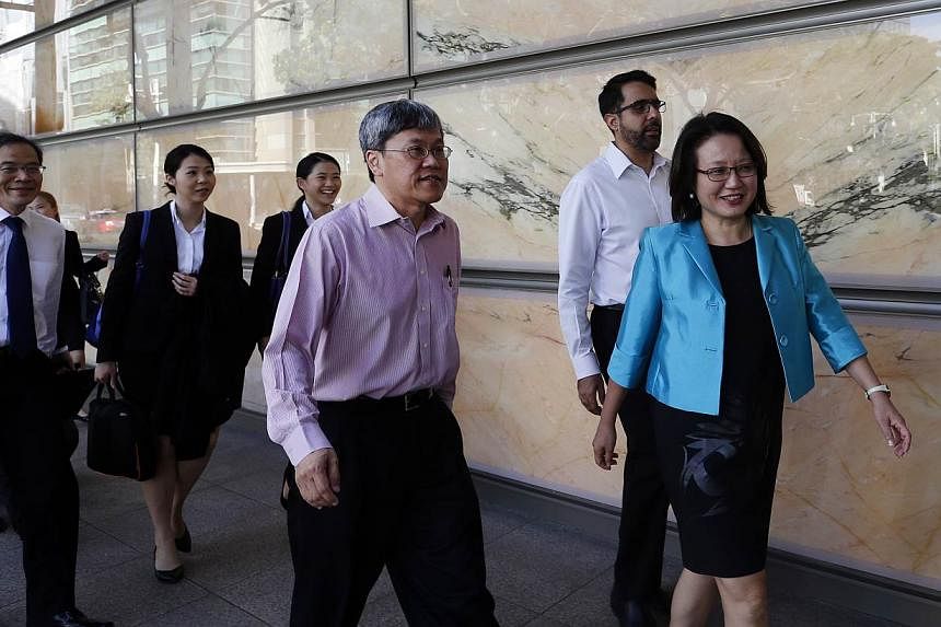 WP chairman Sylvia Lim (right) together with her team walking into the supreme court on June 4, 2015. In a statement on Thursday, MND had said AHPETC was in urgent need of the grants, but had "consistently resisted" the ministry's offer to disburse h
