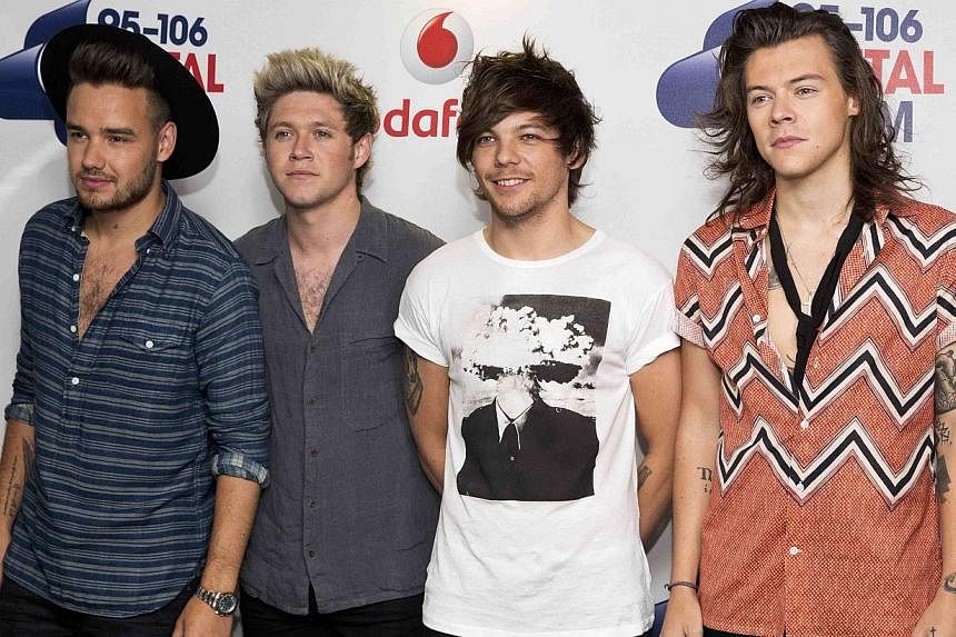 Members of boyband One Direction pose at the Capital Summertime Ball at Wembley Stadium in London, Britain on June 6, 2015. The British pop group insisted on Saturday they would not be splitting up despite the departure of band member Zayn Malik. -- 
