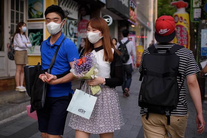 The public has been urged to cooperate with the government to stem undue confusion and to maintain good personal hygiene to help stop Mers from spreading. -- PHOTO: AFP