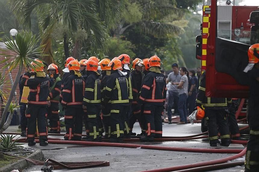 A fire broke out at a house in Yio Chu Kang early on Tuesday morning, injuring at least six people. -- ST PHOTO: LAU FOOK KONG&nbsp;