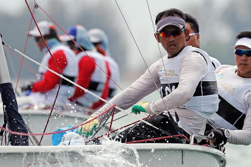 The trio of Stanley Chan, Anthony Kiong and Colin Ng clinched the third gold in the&nbsp;men's keelboat fleet racing.&nbsp;-- PHOTO:&nbsp;SINGAPORE SEA GAMES ORGANISING COMMITEE/ACTION IMAGES VIA REUTERS