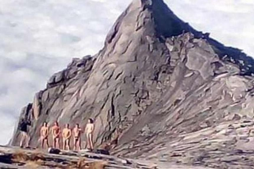 The stripping stunt by 10 foreign tourists on Mount Kinabalu was the latest in a series of offences committed by climbers over the years, say guides. -- PHOTO: THE STAR/ASIA NEWS NETWORK