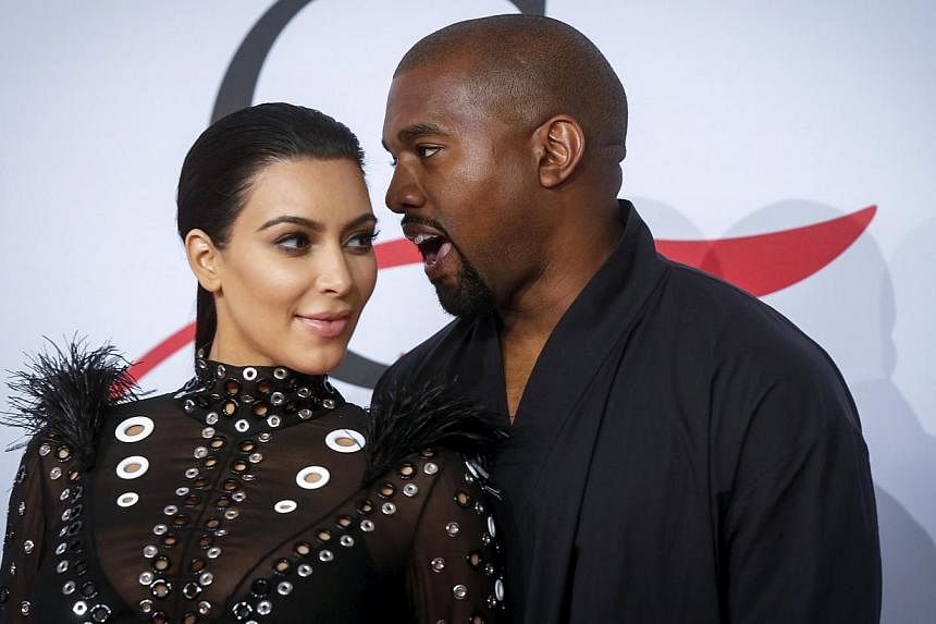Television personality Kim Kardashian arrives with Kanye West to attend the 2015 CFDA Fashion Awards in New York on June 1, 2015. -- PHOTO: REUTERS&nbsp;