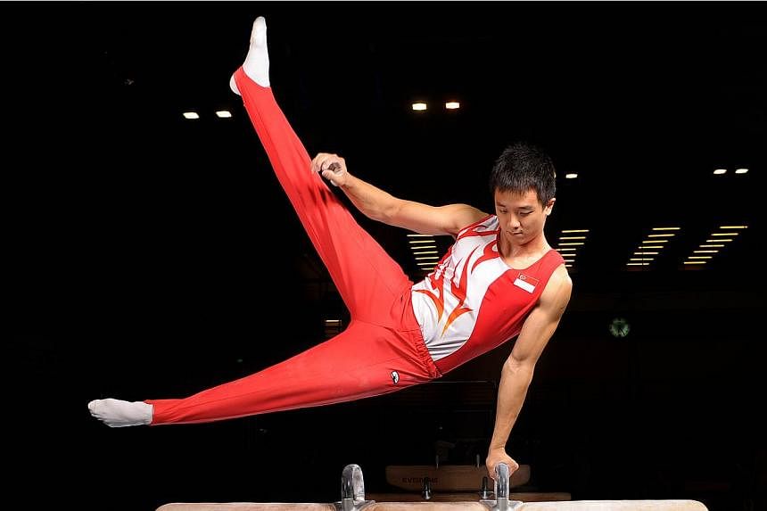 Team captain Gabriel Gan's second-place finish in the men's pommel horse was one of two silvers Singapore's artistic gymnasts clinched on June 9, 2015. -- PHOTO: ST FILE