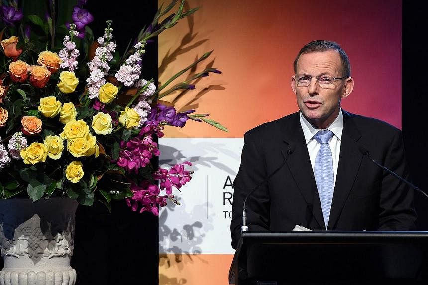 Australian Prime Minister Tony Abbott delivers his key notes at the Regional Countering Violent Extremism Summit in Sydney on June 11, 2015. -- PHOTO: AFP