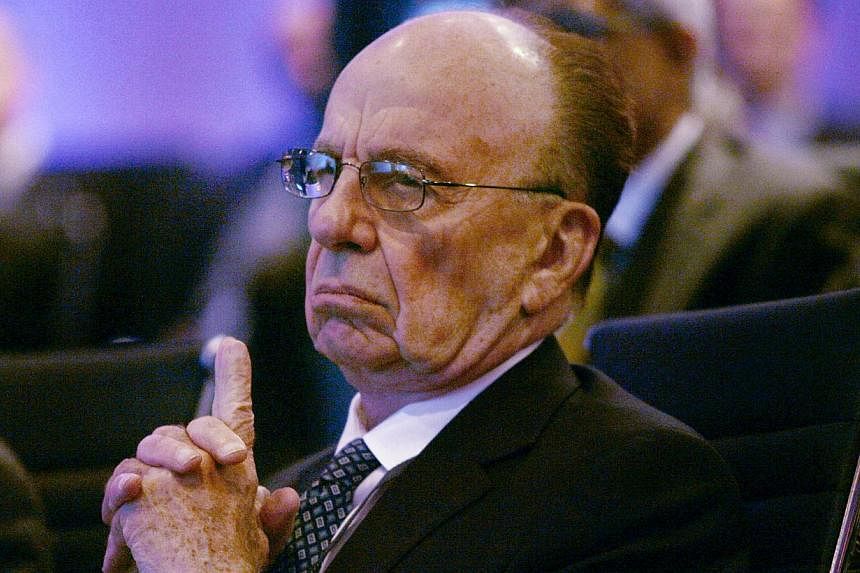 Rupert Murdoch is preparing to step down as CEO of 21st Century Fox. His son James will be taking over the media-entertainment conglomerate. -- PHOTO: REUTERS&nbsp;