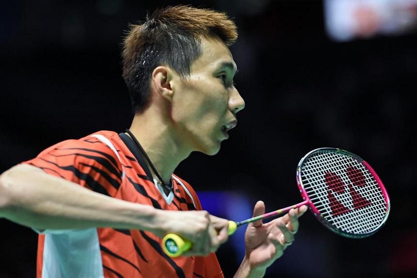 Malaysia's Lee Chong Wei in action during the SEA Games' badminton competition. -- PHOTO: AFP&nbsp;