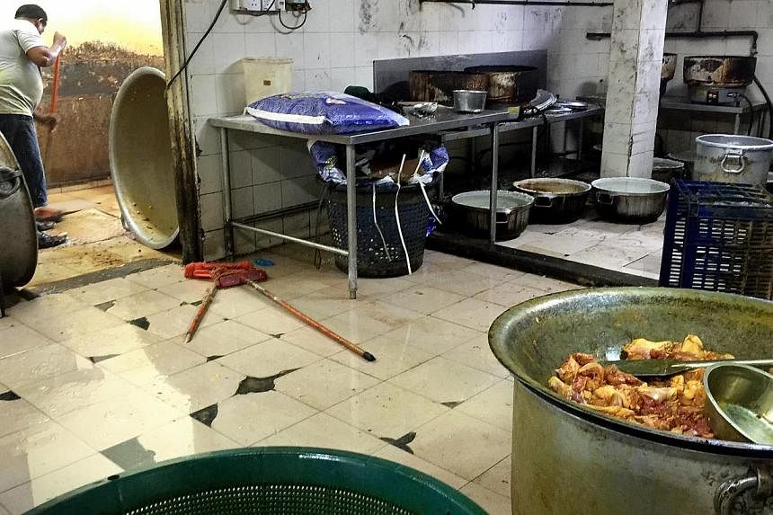 The interior of a food catering company which prepares food for Bangladeshi workers. Over nine in 10 Bangladeshi migrant workers here are given unclean and unhygienic food to eat from caterers, a new survey has found. -- ST PHOTO: KUA CHEE SIONG