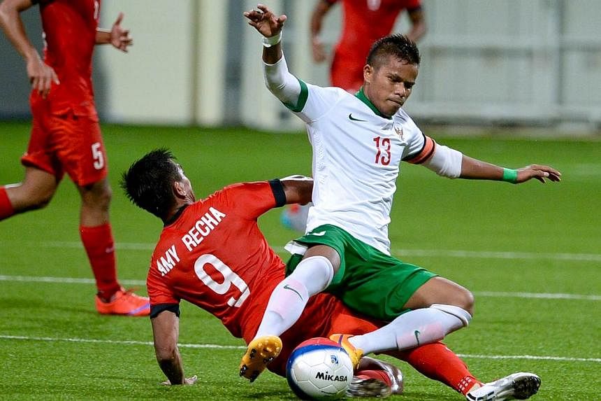 Singapore crashed out of the SEA Games football tournament after losing 0-1 to Indonesia in their final Group A match on Thursday evening. -- ST PHOTO: DESMOND FOO&nbsp;
