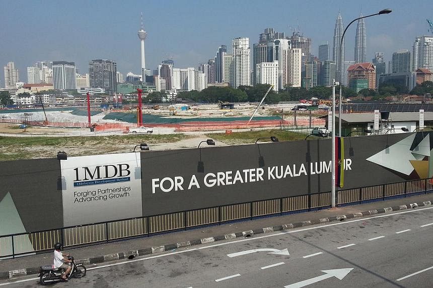 Malaysia's 1MDB said on Friday it will start looking for suitors to invest in Bandar Malaysia, one of its two major property projects, the other being Tun Razak Exchange (above). -- ST FILE PHOTO