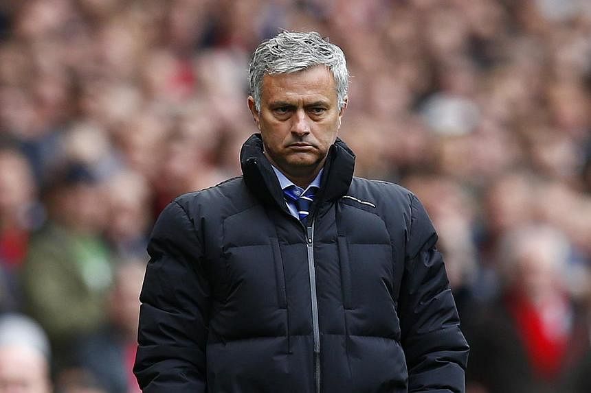 Chelsea manager Jose Mourinho (above) has been banned from driving for six months after he was caught speeding close to the club's training ground. -- PHOTO: REUTERS