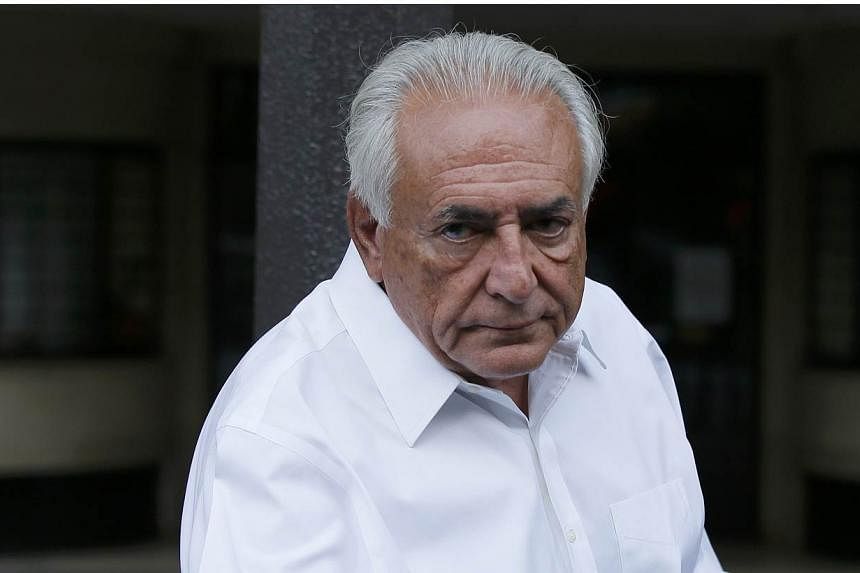 A French court on Friday acquitted former International Monetary Fund (IMF) chief Dominique Strauss-Kahn of pimping charges, drawing a line under the latest in a series of legal woes over his sexual escapades. -- PHOTO: REUTERS
