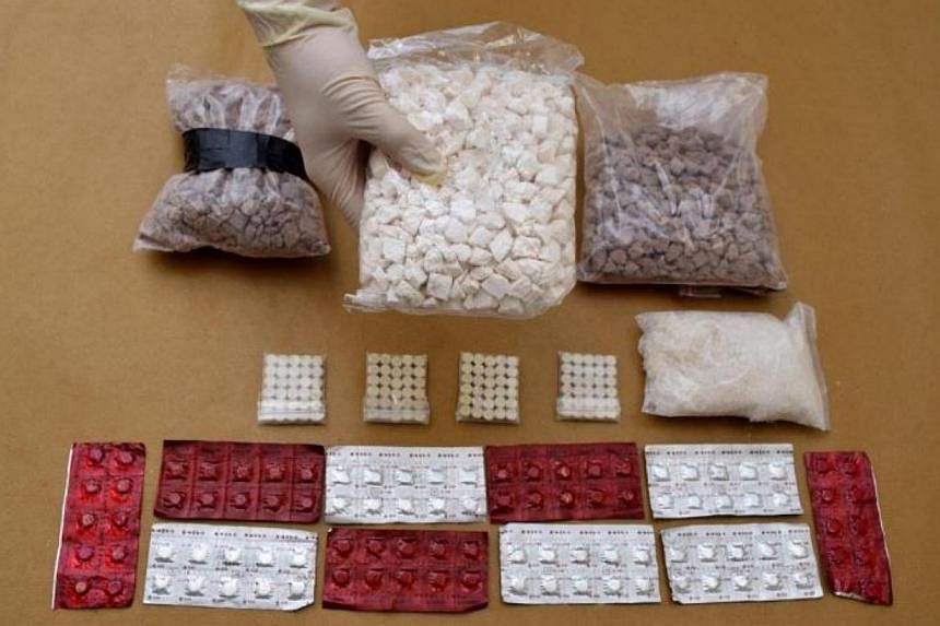 The drugs contained in the bundles found in the Singapore-registered taxi. -- PHOTO: ICA/CNB&nbsp;