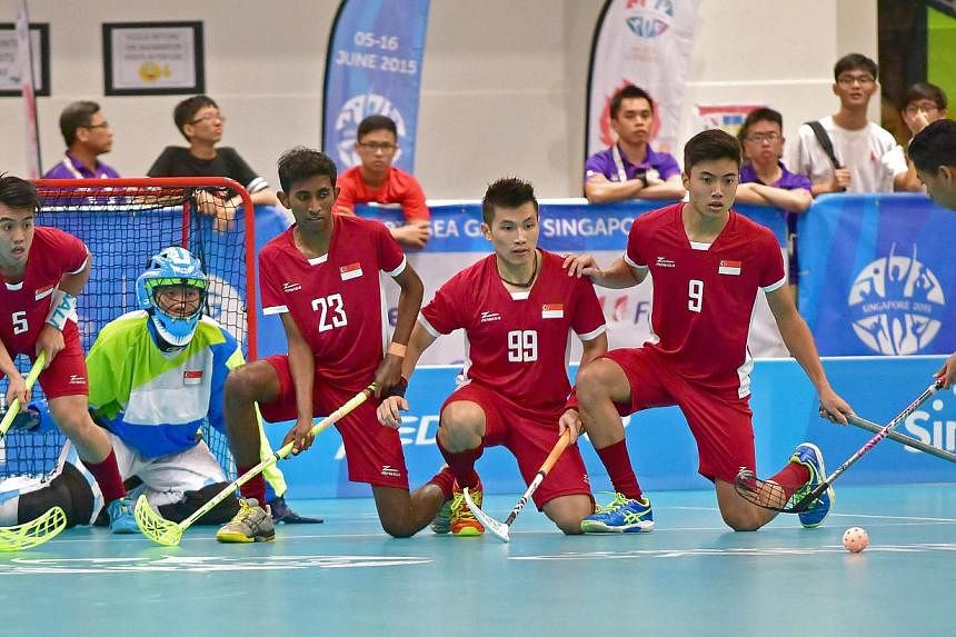 Singapore's men's floorball team in action during the preliminary rounds. Both the men's and women's teams will face Thailand in the final. -- PHOTO: SEA GAMES ORGANISING COMMITTEE/ACTION IMAGES VIA REUTERS