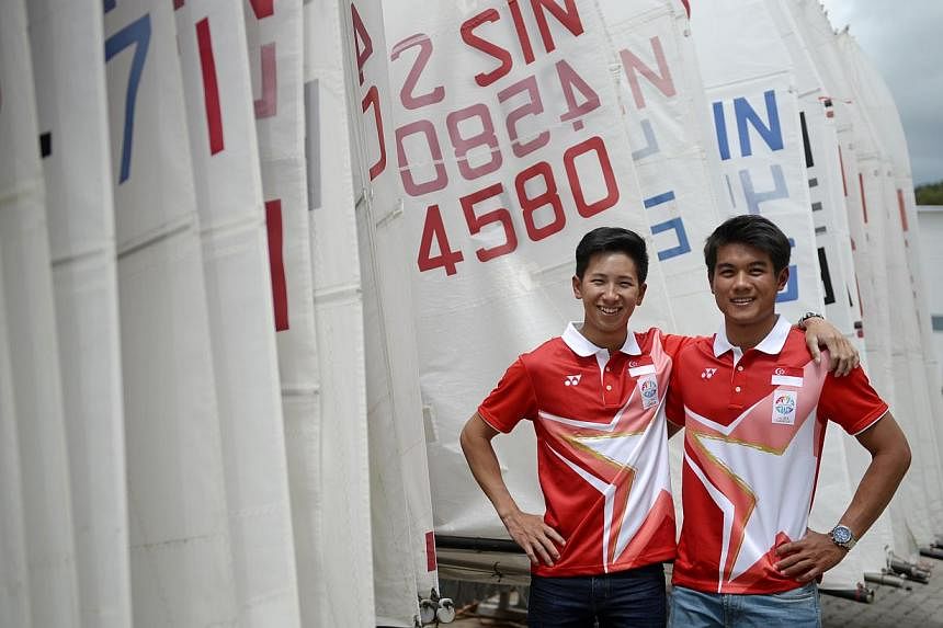 Singapore sailors Darren Choy (left) and Jeremiah Yeo clinched gold in the double-handed 470 men's race on June 13, 2015. -- ST PHOTO: MARK CHEONG&nbsp;