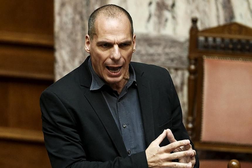Greek Finance Minister Yanis Varoufakis answers a question during a parliamentary session in Athens on June 11, 2015. -- PHOTO: REUTERS&nbsp;
