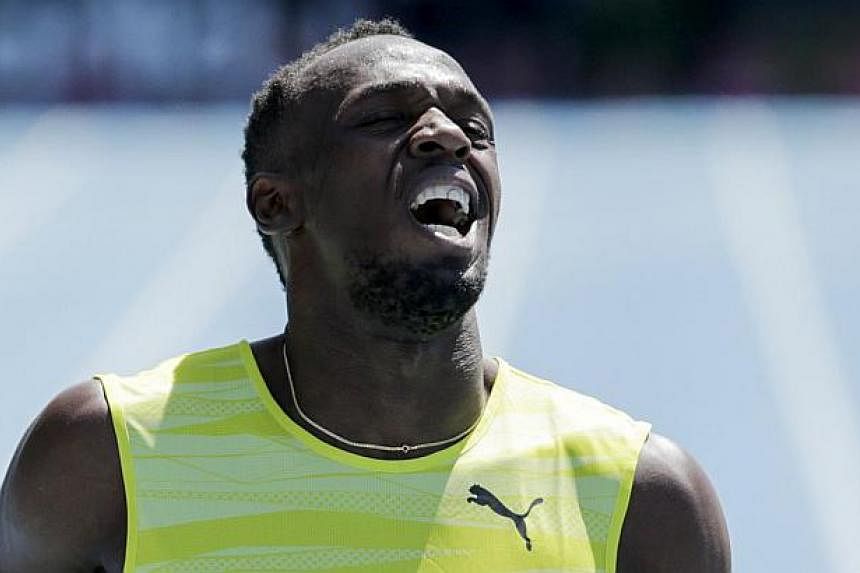 Usain Bolt of Jamaica reacts after winning the 200m at the IAAF Diamond League Grand Prix track and field competition in New York on June 13, 2015. -- PHOTO: REUTERS