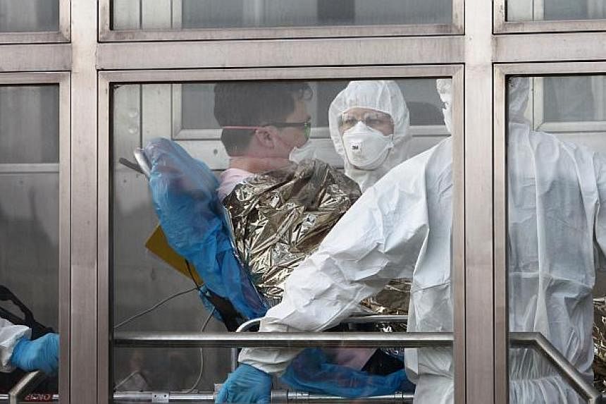 A 39-year-old South Korean patient suspected of suffering from Middle East Respiratory Syndrome (Mers) is admitted to Kramare hospital in Bratislava, Slovakia, after the he was transported by medical staff from the Northern Slovak town of Zilina on J