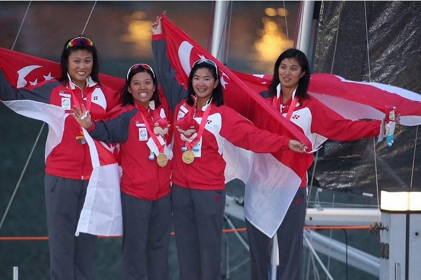The quartet of Jovina Choo, Daniella Ng, Terena Lam and Dawn Liu won the women's keelboat event on June 14, 2015. -- ST PHOTO: NEO XIAOBIN&nbsp;