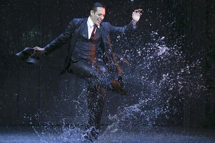 Actor Grant Almirall says he has to make his role in Singin’ In The Rain look effortless but he is actually “dying inside” as it is so hot. -- PHOTO: HAGEN HOPKINS