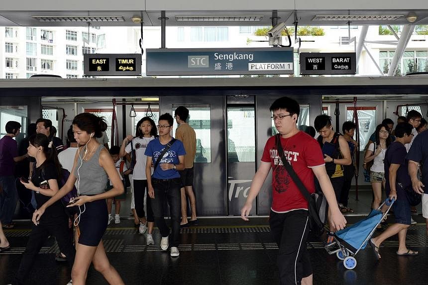Commuters at the Sengkang LRT station. -- PHOTO: ST FILE&nbsp;
