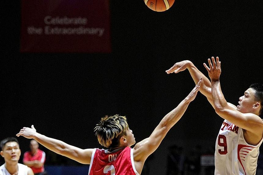 Singapore's men's basketball team will be without captain Desmond Oh (left) and forward Lim Shengyu in their bronze medal match against Thailand on Monday (June 15) nights. -- PHOTO: SINGAPORE SEA GAMES ORGANISING COMMITTEE/ACTION IMAGES VIA REUTERS