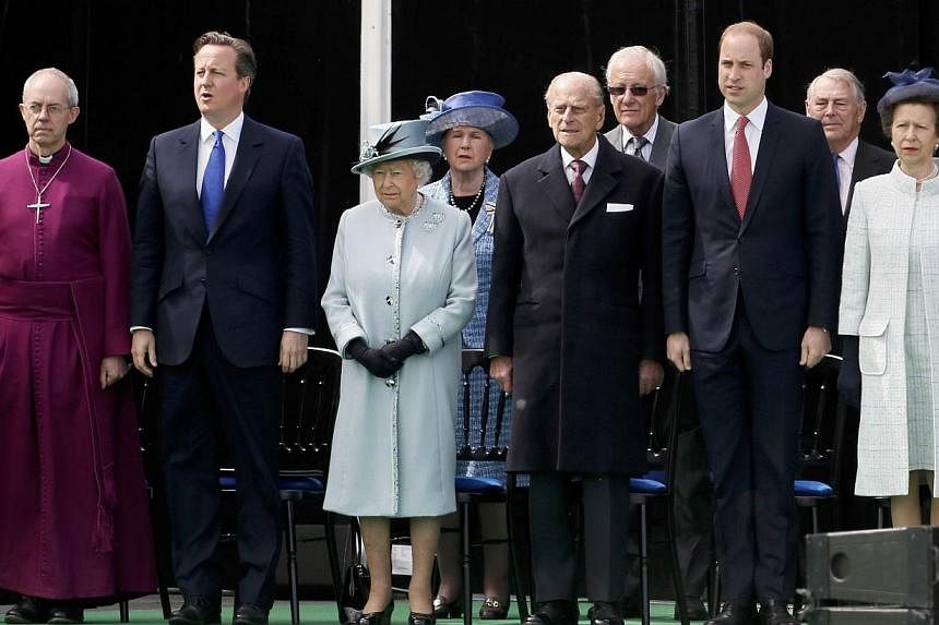 (From left) The Archbishop of Canterbury Justin Welby, Britain's Prime Minister David Cameron, Britain's Queen Elizabeth, Prince Philip, Britain's Prince William and Princess Anne attend an event marking the 800th anniversary of Magna Carta in Runyme
