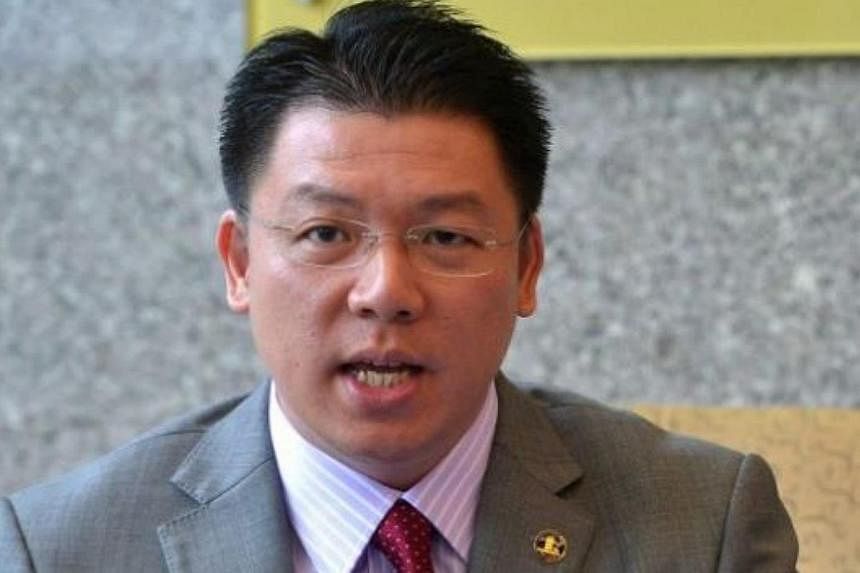 Prime Minister Najib Razak and his wife Rosmah Mansor are suing Democratic Action Party's (DAP) Taiping MP Nga Kor Ming (pictured) for allegedly defaming them in a post on Facebook. -- PHOTO:&nbsp;THE STAR/ASIA NEWS NETWORK&nbsp;