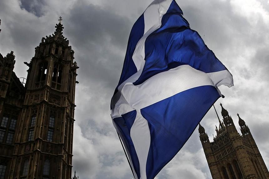 The Scottish National Party (SNP) has threatened to call for another referendum to break up the United Kingdom unless the British government agrees to devolve more powers to Scotland, the Financial Times reported on Monday, June 15, 2015. -- PHOTO: A