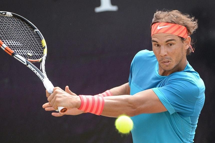 Rafael Nadal of Spain in action during the final match against Viktor Troicki of Serbia at the ATP tennis tournament in Stuttgart, Germany on Sunday. -- PHOTO: EPA
