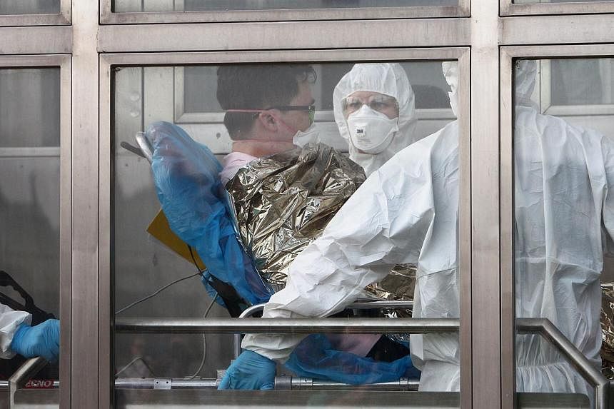 A South Korean patience suspected of suffering from Middle East Respiratory Syndrome (Mers) is admitted to Kramare hospital in Bratislava, Slovakia. -- PHOTO: AFP&nbsp;