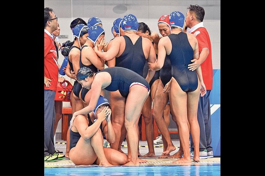 The Singapore women's water polo team, who were the defending champions, suffered a shock 4-5 loss to Thailand yesterday. -- ST PHOTO: CHONG JUN LIANG