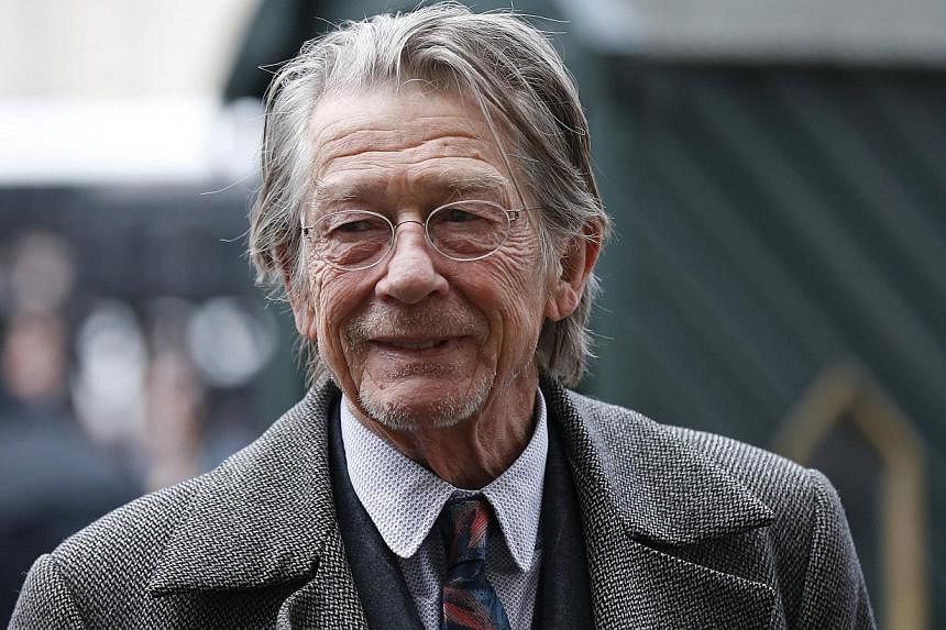 Actor John Hurt arrives for a memorial service for actor and director Richard Attenborough at Westminster Abbey in London, Britain in this March 17, 2015, file photo. Hurt, 75, revealed on June 16, 2015, that he has been diagnosed with pancreatic can