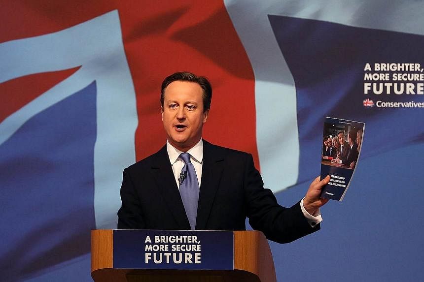 Britain's Prime Minister and leader of the Conservative Party, David Cameron, unveils his party's general election manifesto in Swindon, southern England, on April 14, 2015.&nbsp;Mr Cameron has performed a U-turn and ruled out holding a European Unio